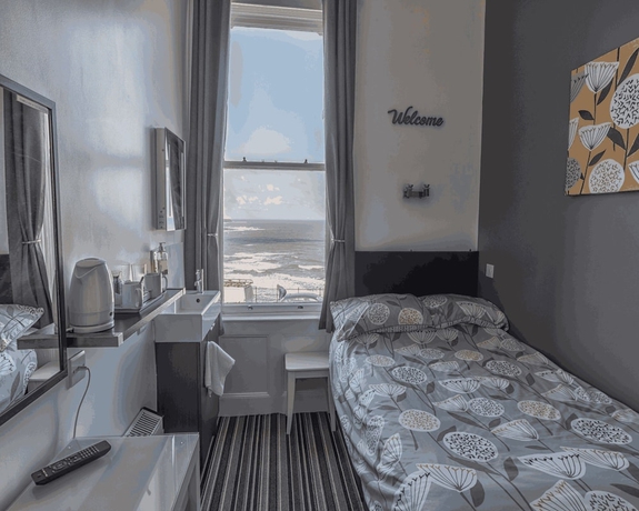 Imagen de la habitación del Hotel Miricia Guest House. Foto 8