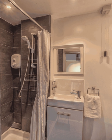 Imagen de la habitación del Hotel Miricia Guest House. Foto 9