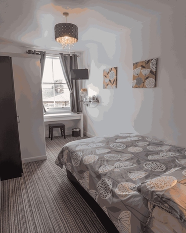 Imagen de la habitación del Hotel Miricia Guest House. Foto 10