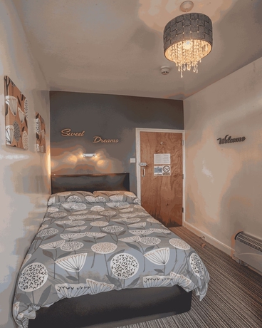 Imagen de la habitación del Hotel Miricia Guest House. Foto 11