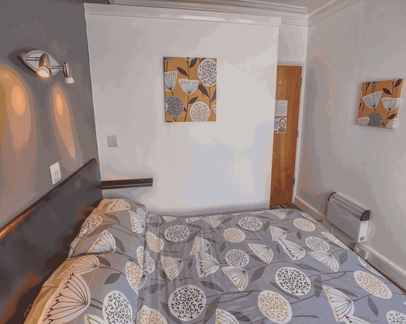 Imagen de la habitación del Hotel Miricia Guest House. Foto 12