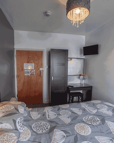 Imagen de la habitación del Hotel Miricia Guest House. Foto 14