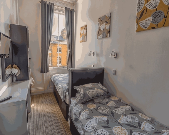 Imagen de la habitación del Hotel Miricia Guest House. Foto 17
