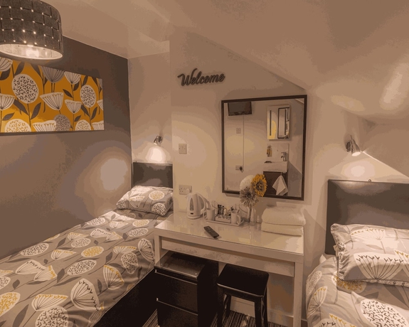 Imagen de la habitación del Hotel Miricia Guest House. Foto 18