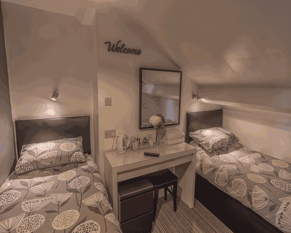 Imagen de la habitación del Hotel Miricia Guest House. Foto 19