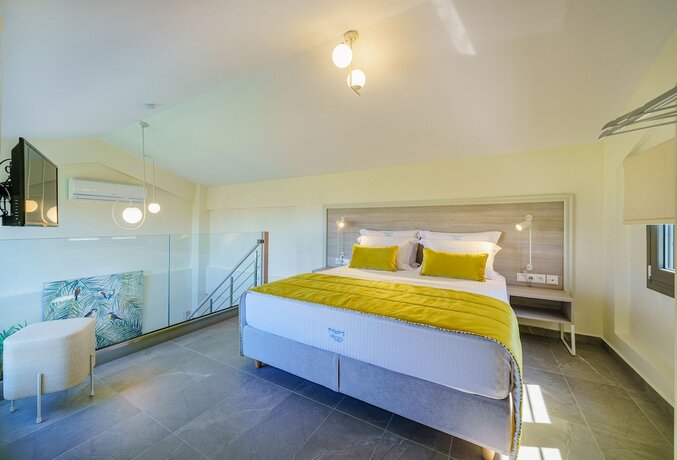 Imagen de la habitación del Hotel Miroes Suites. Foto 15
