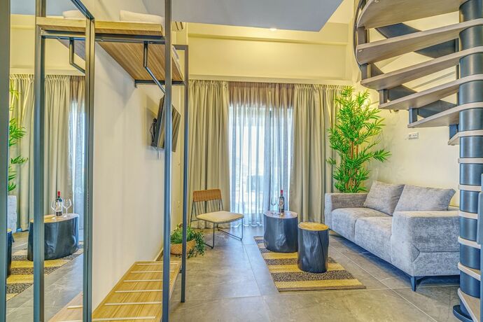 Imagen de la habitación del Hotel Miroes Suites. Foto 17