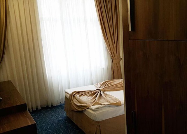 Imagen de la habitación del Hotel Miroglu, Yenişehir. Foto 5