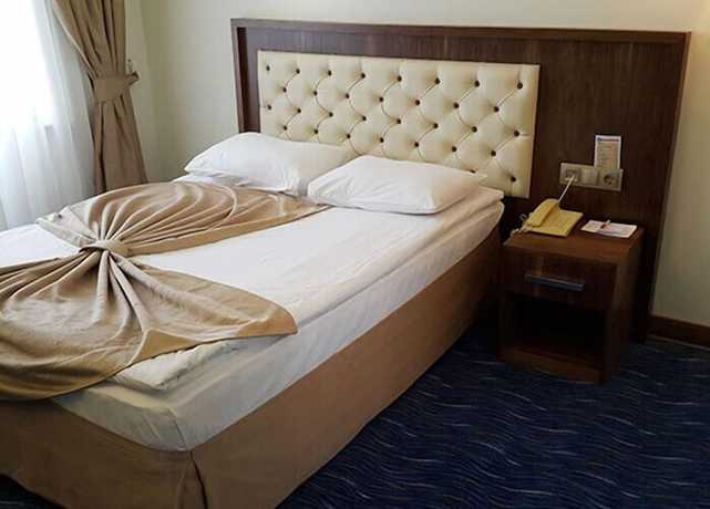 Imagen de la habitación del Hotel Miroglu, Yenişehir. Foto 7