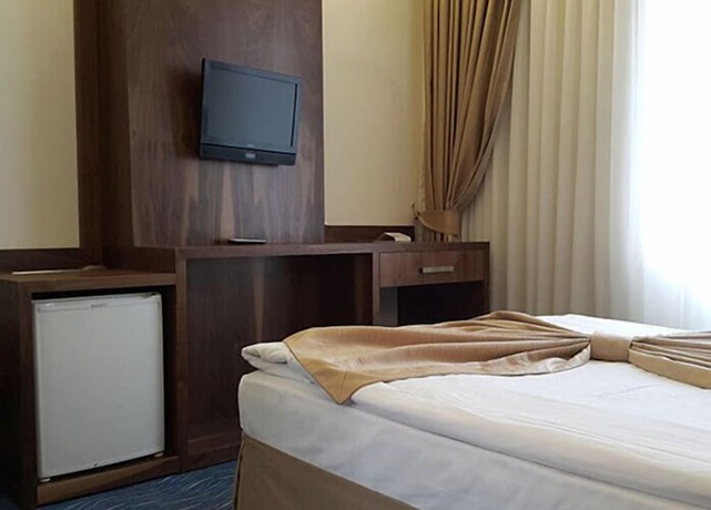 Imagen de la habitación del Hotel Miroglu, Yenişehir. Foto 8