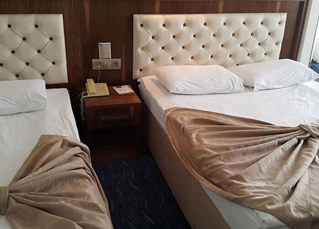 Imagen de la habitación del Hotel Miroglu, Yenişehir. Foto 10