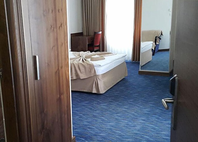 Imagen de la habitación del Hotel Miroglu, Yenişehir. Foto 14