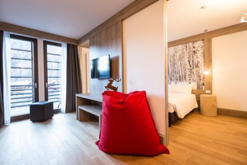 Imagen de la habitación del Hotel Mirtillo Rosso Family. Foto 7