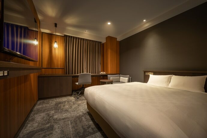 Imagen de la habitación del Hotel Misawa City. Foto 17
