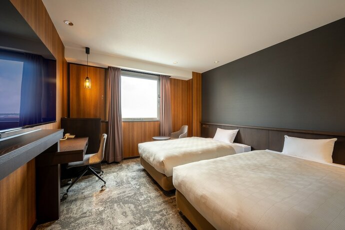 Imagen de la habitación del Hotel Misawa City. Foto 18