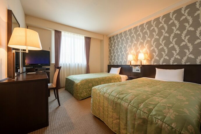 Imagen de la habitación del Hotel Misawa City. Foto 21