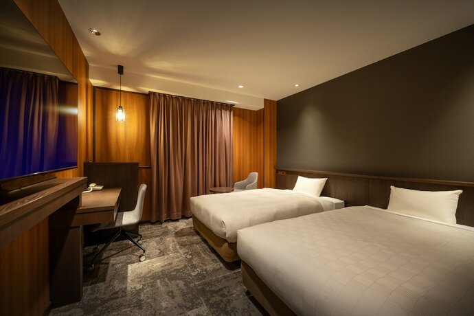 Imagen de la habitación del Hotel Misawa City. Foto 22
