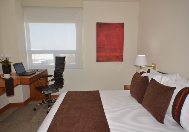 Imagen de la habitación del Hotel Misión Express Monterrey Aeropuerto La Fe. Foto 8