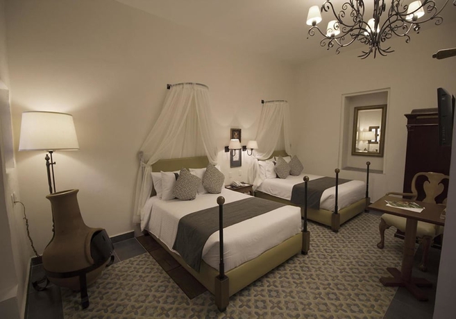 Imagen de la habitación del Hotel Misi&oacute;n Grand Ex - Hacienda De Chautla. Foto 11