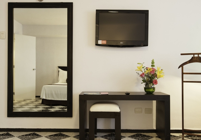 Imagen de la habitación del Hotel Misión Mérida Panamericana. Foto 8