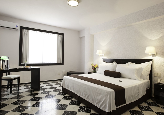 Imagen de la habitación del Hotel Misión Mérida Panamericana. Foto 10