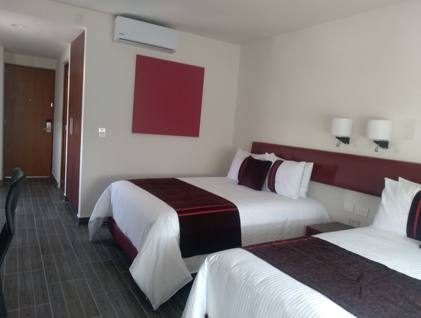 Imagen de la habitación del Hotel Misi&oacute;n Puebla Angelopolis. Foto 10