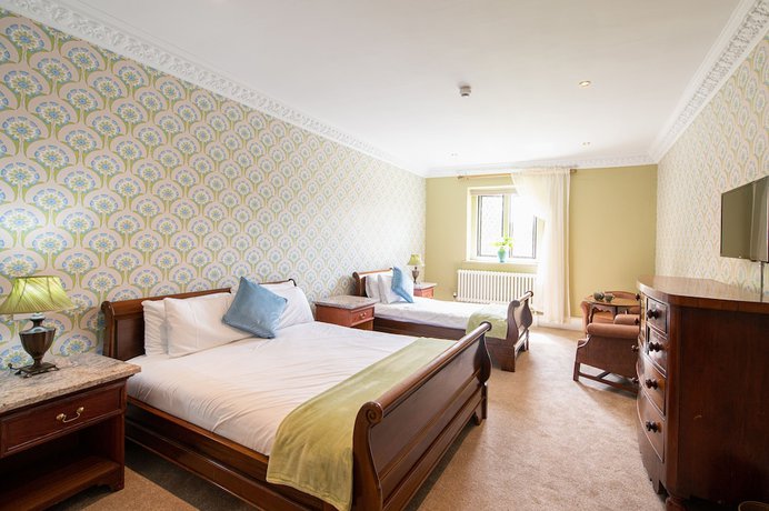 Imagen de la habitación del Hotel Miskin Manor And Health Club. Foto 13