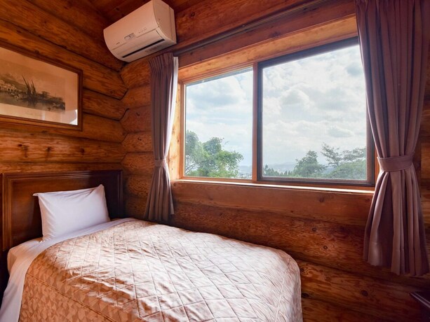 Imagen de la habitación del Hotel Mission Hills Geihinkan. Foto 19