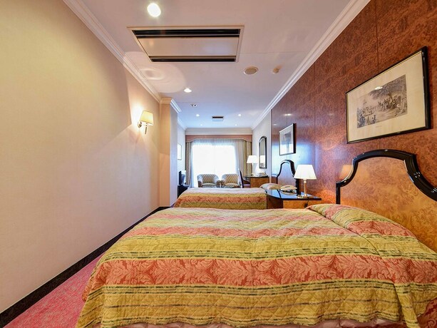 Imagen de la habitación del Hotel Mission Hills Geihinkan. Foto 23