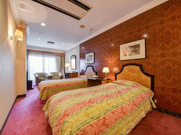 Imagen de la habitación del Hotel Mission Hills Geihinkan. Foto 26