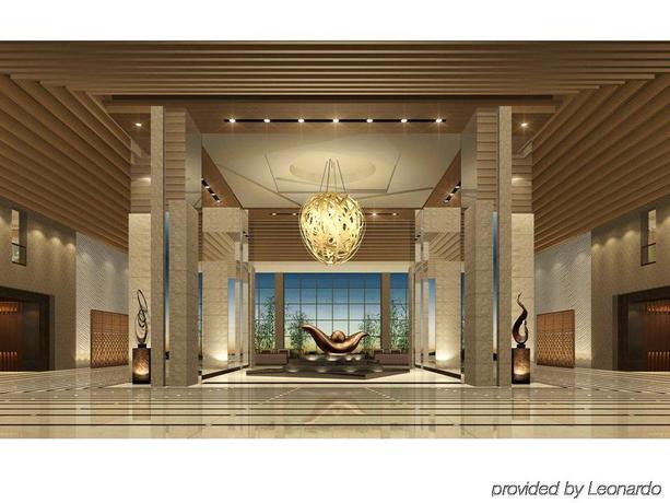 Imagen de los interiores del Hotel Mission Hills Golf Club and Resorts Shenzhen. Foto 13
