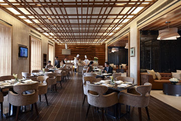 Imagen del bar/restaurante del Hotel Mission Hills Golf Club and Resorts Shenzhen. Foto 4