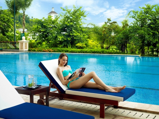 Imagen de la piscina del Hotel Mission Hills Resort Dongguan. Foto 19