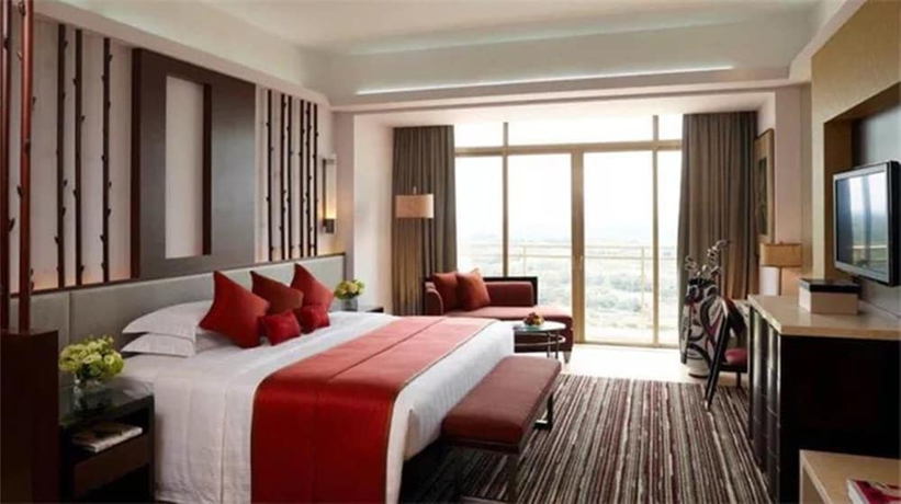 Imagen de la habitación del Hotel Mission Hills Resort Haikou. Foto 10