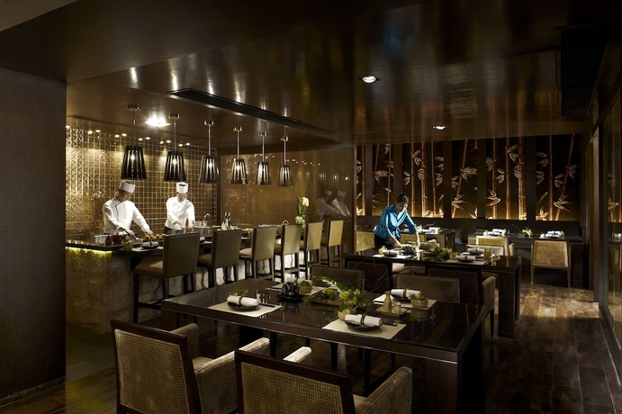 Imagen del bar/restaurante del Hotel Mission Hills Resort Haikou. Foto 3