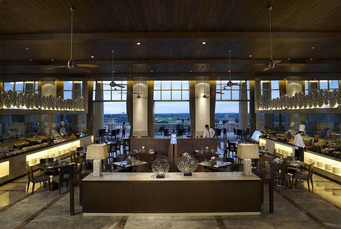 Imagen del bar/restaurante del Hotel Mission Hills Resort Haikou. Foto 4