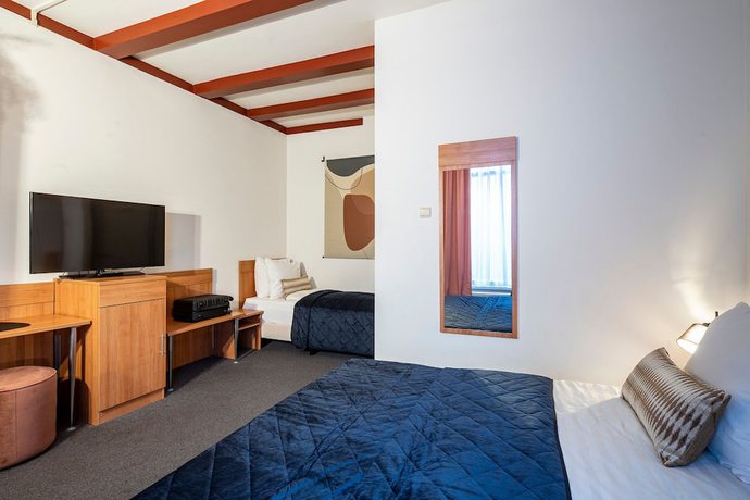 Imagen de la habitación del Hotel Mister Highland. Foto 4