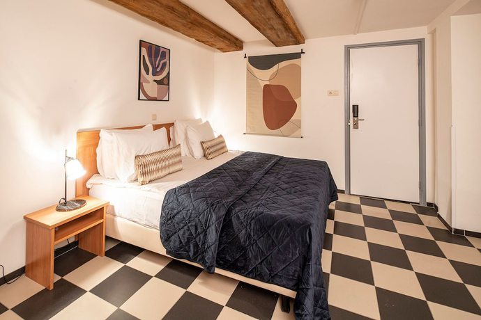 Imagen de la habitación del Hotel Mister Highland. Foto 7