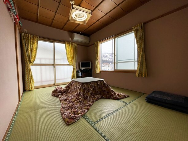Imagen de la habitación del Hotel Mistral, Minamiuonuma. Foto 18