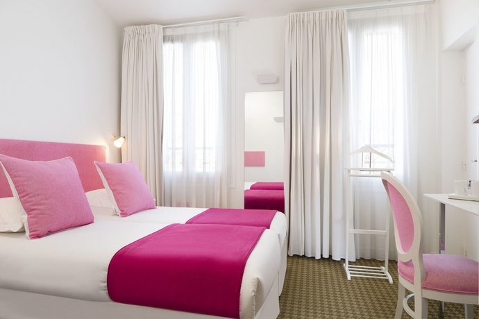 Imagen de la habitación del Hotel Mistral, París. Foto 12