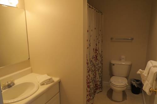 Imagen de la habitación del Hotel Misty Harbor Barefoot Beach Resort. Foto 15