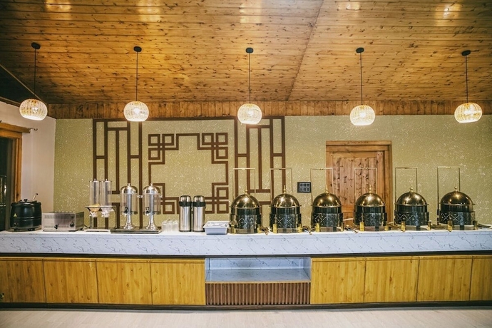 Imagen del bar/restaurante del Hotel Misty Hills Cabins Nubra. Foto 2