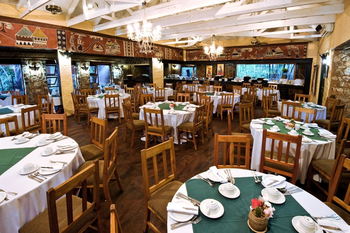 Imagen del bar/restaurante del Hotel Misty Hills Country. Foto 3
