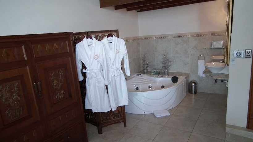 Imagen de la habitación del Hotel Misty Waves Boutique. Foto 7