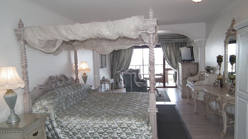 Imagen de la habitación del Hotel Misty Waves Boutique. Foto 15