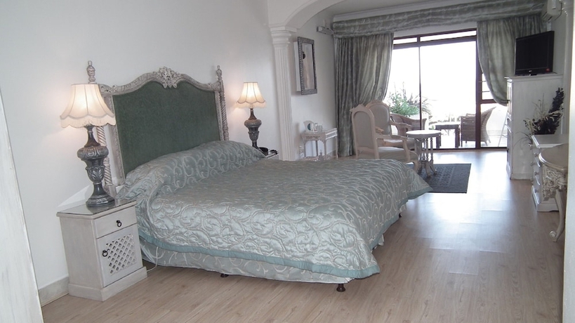 Imagen de la habitación del Hotel Misty Waves Boutique. Foto 17