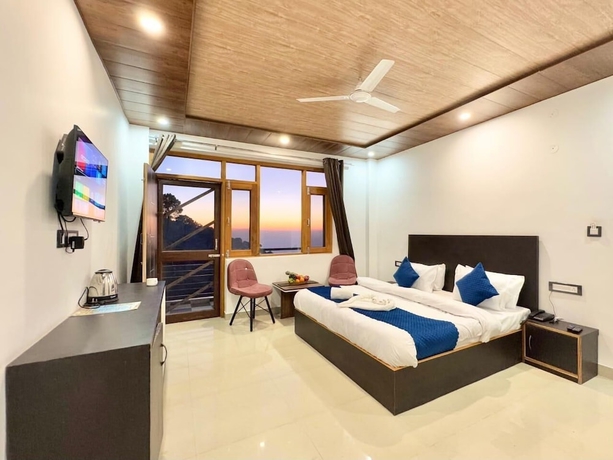 Imagen de la habitación del Hotel Misty Winds Kasauli. Foto 11