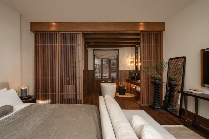 Imagen de la habitación del Hotel MistyHues DawnGreen. Foto 6