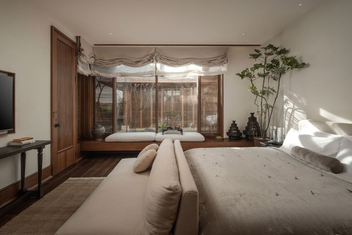 Imagen de la habitación del Hotel MistyHues DawnGreen. Foto 7