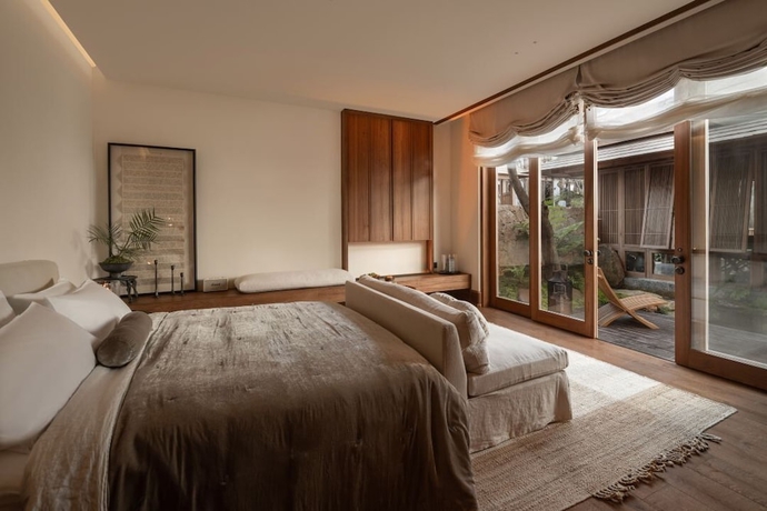 Imagen de la habitación del Hotel MistyHues DawnGreen. Foto 8